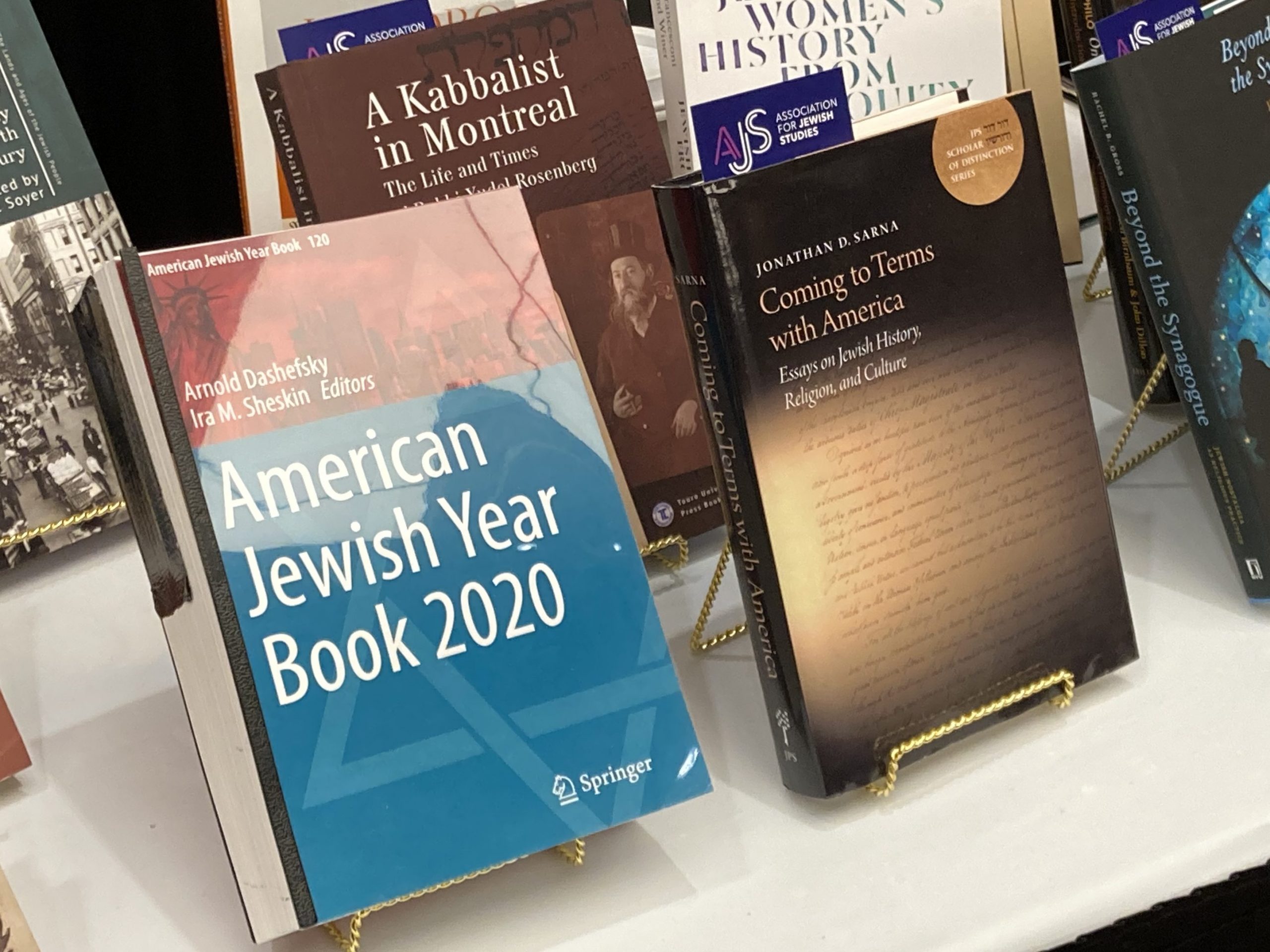 Books on display that are in an AJS feature, with American Jewish Yearbook 2020 front and Center