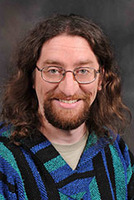 Chris Clarke, a 2004 Master of Arts graduate
